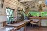 Charming potting shed with generous potting benches, abundant workspace, and period character