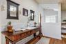Bespoke antique vanity with oversized steam shower