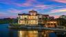 Located behind the exclusive North Gate of Hammock Dunes, this extraordinary Mediterranean estateoccupies one of the community’s most iconic peninsula