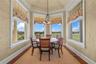 Everyday meals feel anything but ordinary in this sunlit nook overlooking rolling fairways and endless skies.