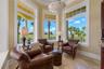 A favorite spot to start the morning or wind down at day's end, this intimate sitting alcove invites conversation, coffee, and quiet moments while ove