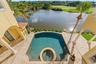 Start the morning with a swim, unwind in the spa after a round of golf, and spend the afternoon watching wildlife drift across the lake from your priv