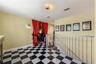 Behind the curtain awaits your private theater, while the retro-inspired lounge outside sets the stage for intermission drinks, conversation, and a li