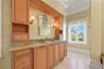 Blue and gold onyx countertops echo the colors of the ocean and coquina shoreline, bringing the beauty of the coast indoors.