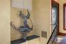 Standing watch in the third-story stairwell, this custom Paul Baliker osprey sculpture is more than art—it's a statement piece that captures the spiri