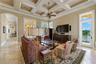 Gather, unwind, or entertain in the inviting first-floor family room, a favorite spot to relax after a day with quick access to the covered lanai and 