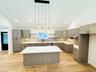 Lots of light, lots of counter + cabinet space.