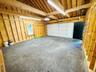2-car garage, attached via a breezeway to home. Power doors.