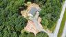 House from above showing driveway and road
