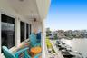 balcony facing west to Gulf of Mexico view and north Boca CIEGA Bay views