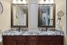 Primary Bath dual vanity with custom storage cabinet