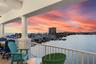 Full balcony extends from living room to master en-suite equipped with electrical and ceiling patio fans
