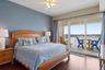 Primary En-suite with 12x8 sliding glass door to balcony view