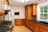The Kitchen connects to the breakfast room which has access to the deck