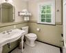 The hall bath on the second floor has been renovated