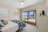 Guest Room One with patio access
