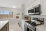 Kitchen with stainless steel appliances