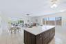 Kitchen View into Dining and Living Area