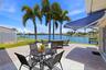Backyard with large waterfront patio