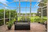 Screened Lanai overlooking the Pond and green