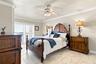 Primary Bedroom with hurricane sliders to patio and gulf views