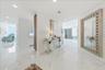 Soaring ceilings creating an open, luxurious feel.