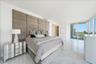 Luxurious owner's retreat with panoramic bay views.