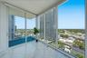 Additional outdoor living space with panoramic city and water views.