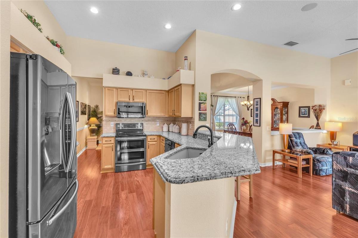 The kitchen is the heart of this home with access to living, dining, family, and secondary bedrooms.