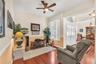 The living and dining rooms offer the perfect setting for entertaining, while the thoughtfully designed layout keeps everyone connected.