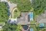 Low HOA with community amenities including parks, playground, tennis and pickleball courts, and a gated park walking within distance.
