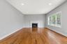Family room will include hardwood floor, gas fireplace and recessed lighting, and high ceiling; some of the features showed in this previously built h