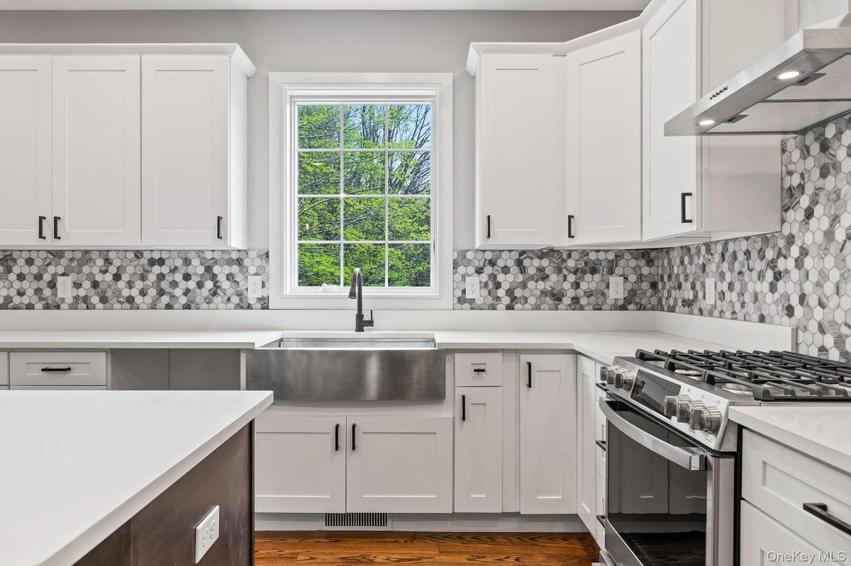 Photos shows one of the designs used by builders on a previously completed home. All subject to change