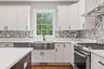 Photos shows one of the designs used by builders on a previously completed home. All subject to change