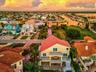 Luxury coastal estate, open concept, chef’s kitchen, Sub-Zero appliances, spa-inspired bathrooms, Jacuzzi tub, granite vanities, custom tile, plantati