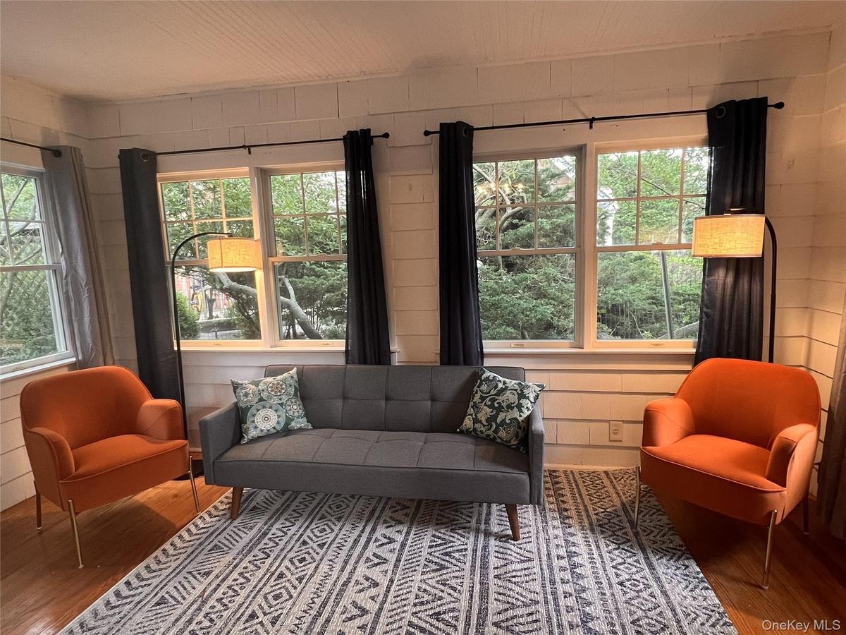 Living room featuring wood finished floors