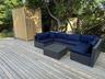 Wooden deck with an outdoor living space