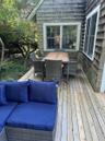 Wooden deck featuring outdoor dining space and outdoor lounge area