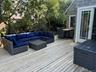 Deck with outdoor lounge area and outdoor dining area