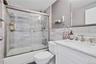 Marble Bathroom With Shower And Vanity