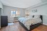 Primary Bedroom With Hardwood Floors