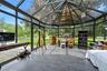 Beautiful sun-room addition, utilized as dining space as well as work space and star-gazing, with unobstructed view of spectacular back-yard