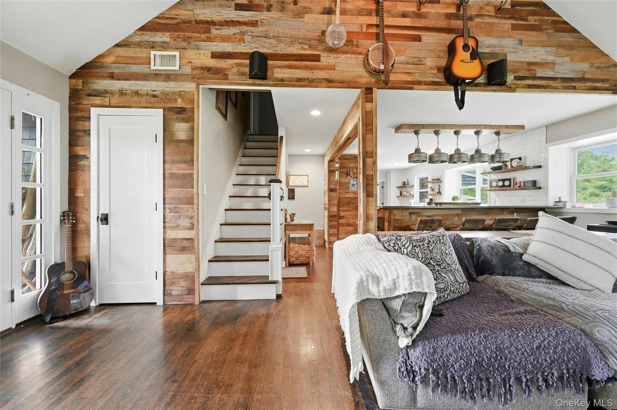 Accent wall featuring varied-tone wood paneling