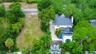 Long driveway on South side along the house, plenty of parking for boat, golf cart and vehicles