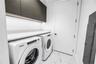 Laundry room with Whirlpool washer and dryer