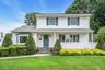 Welcome to 7 Tomkins Court in Commack!