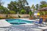 Pool and spa with expanded deck.
