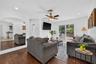 Living room with easy access to the backyard of your dreams.