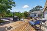 Spacious deck off the kitchen and primary suite.