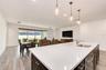 Spacious center island perfect for gathering and meal preparation.